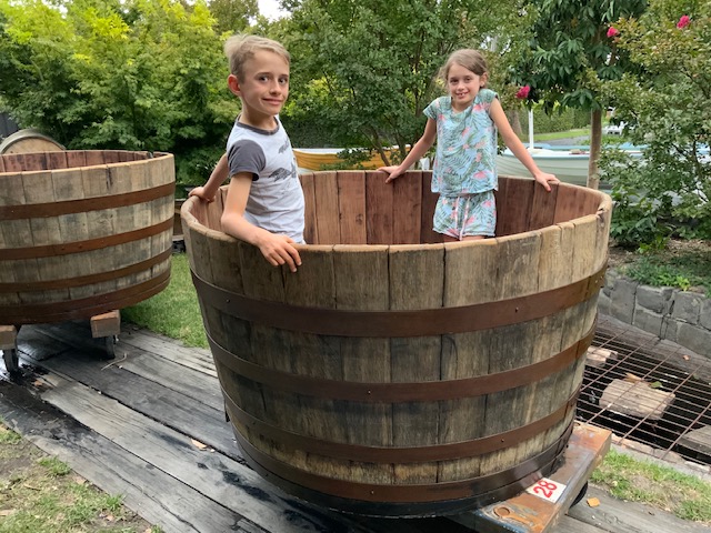 kids in barrel hot tub