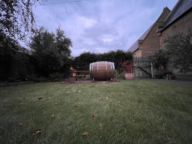 Beautiful hot tub barrel bath in a customers garden