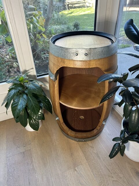 Barrel cabinet, top-down angle showing lid and shelving detail
